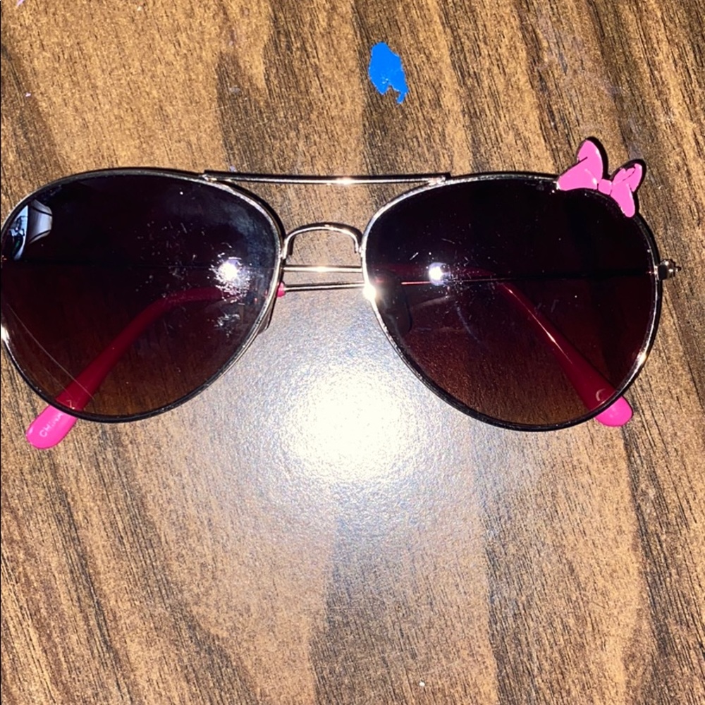 I am seeing sunglasses with a bow